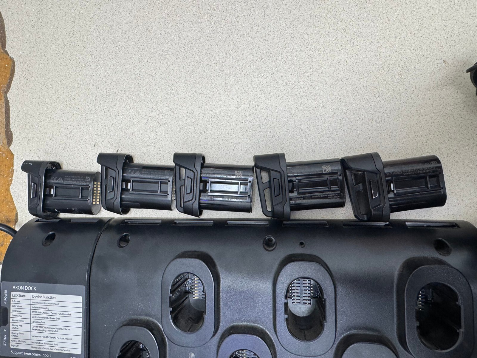5 pre owned taser 7 with 30 set of carts, 5 holster, 5 rechargeable batteries, and 30 set of mixed carts SO and CQ, with 6 base rechargeable dock with accessories and sync software - Image 8