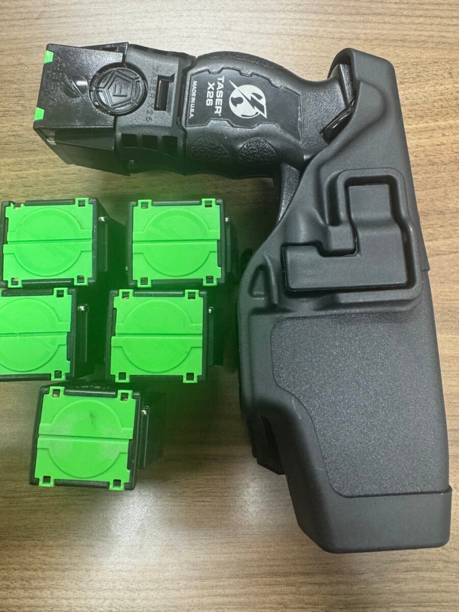 Taser X26 with extended battery sleeve, holster, 7 cartridges